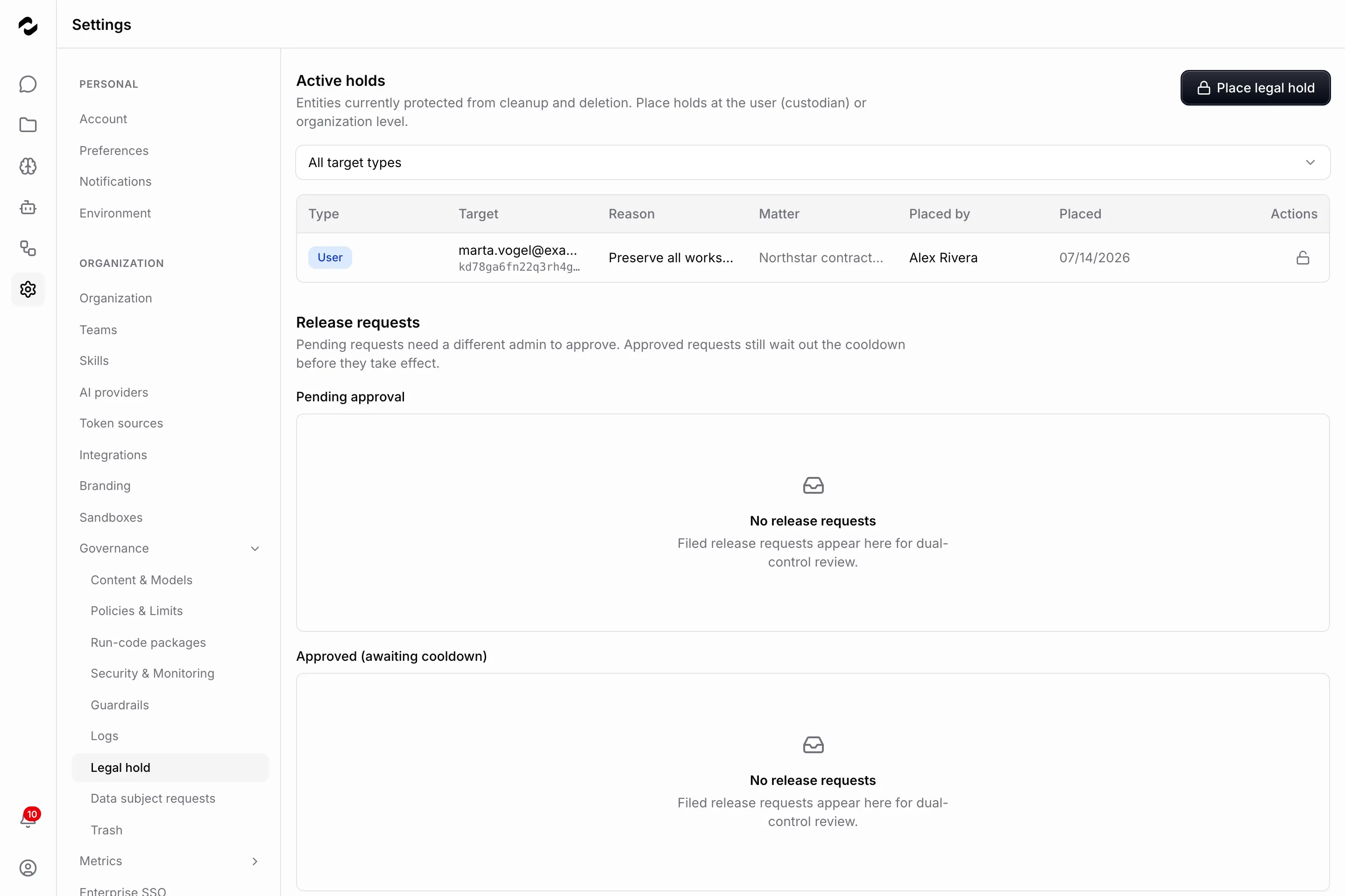 The Legal hold governance page showing one active hold — a User hold on marta.vogel, placed by Alex Rivera under the Northstar contract matter — beside a Place legal hold button, above the Pending approval and Approved release-request queues, both reading No release requests.