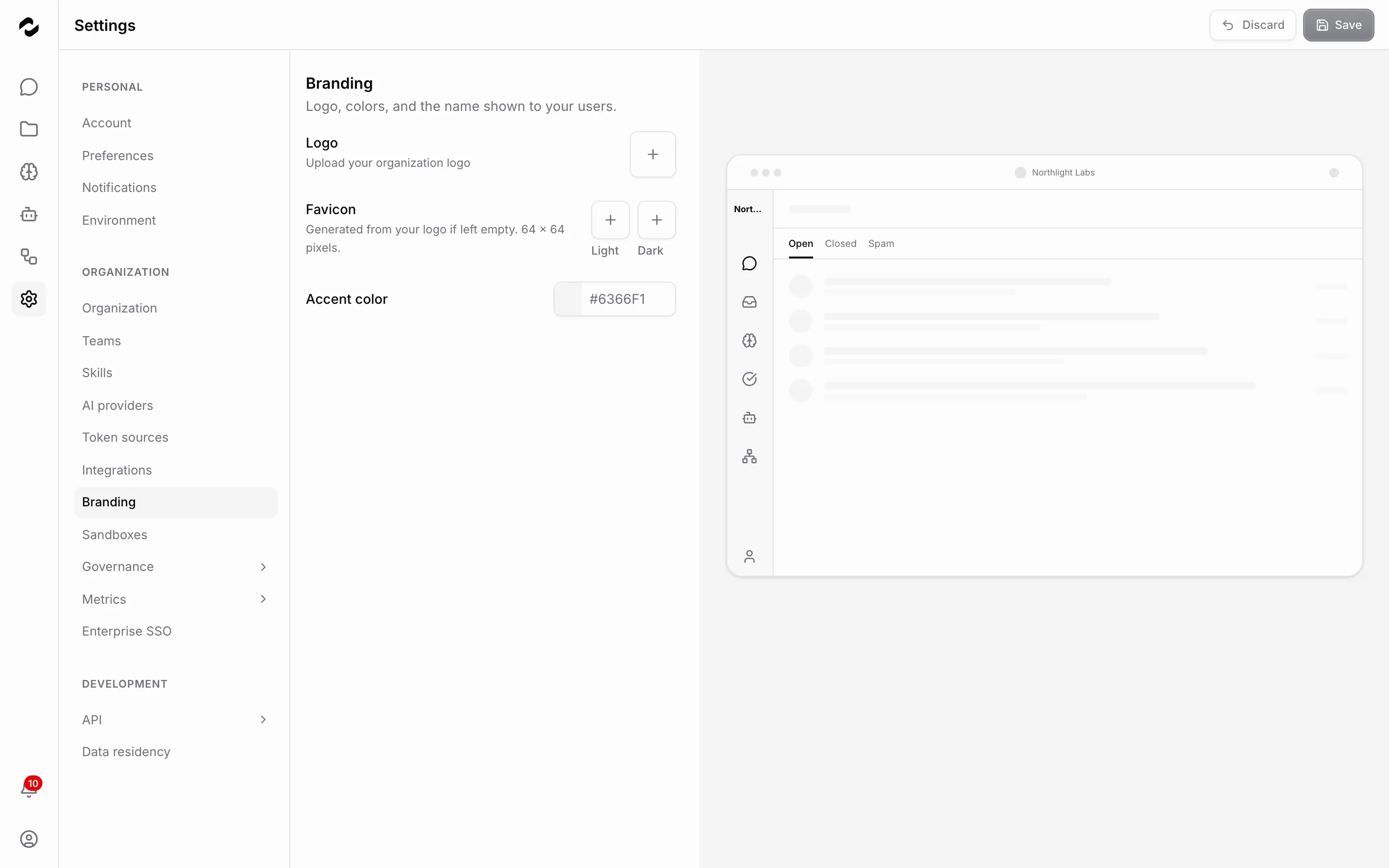 The Branding settings page with logo and favicon uploads, an accent colour field, and a live preview pane on the right.